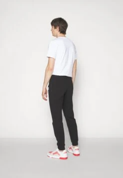 MOSCHINO Trousers - Trainingsbroek - Fantasy Black -ZALANDO WINKEL 108805f1db084bf7ae81b4ccc396a747