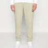 Champion Cuff Pants - Trainingsbroek - Beige -ZALANDO WINKEL 1c24a4b9f0ae4072875544fbabbbfab6