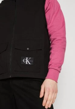 Calvin Klein Jeans Monologo Badge Vest - Bodywarmer - Black -ZALANDO WINKEL 2d2ab694c799411aac4587859a9120f2