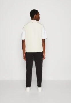 Calvin Klein Superlightweight Vest - Bodywarmer - Stony Beige -ZALANDO WINKEL 86fd0a387f3c4bb59f9e03f43517d3e4