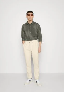 Relaxed Pant Unisex - Broek - Sand -ZALANDO WINKEL 874d82e2f40b4ba9ac2a49a18c692b88
