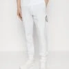 JUST CAVALLI Pantaloni - Trainingsbroek - White/Gold -ZALANDO WINKEL c9e3ffb3d3144a30af51d0257c949ad2