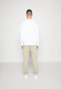 Champion Cuff Pants - Trainingsbroek - Beige -ZALANDO WINKEL cbfa4ff8967e427f98bd20be8ea5933b