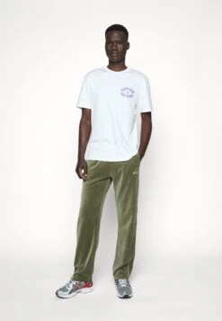 Fila Tegal Track Pants - Trainingsbroek - Olive Night -ZALANDO WINKEL e0bbfcba8cc84a59bfeda8a919d6f270