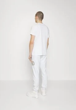 JUST CAVALLI Pantaloni - Trainingsbroek - White/Gold -ZALANDO WINKEL f1a1ec5a250a44d8a05606da432f3ddb